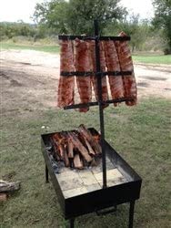 Cruz de asado portatil